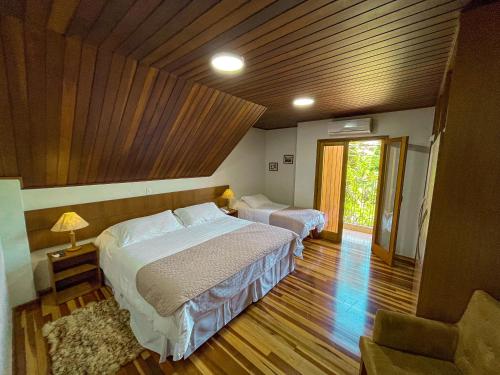 Suite with Air Conditioner room in Pousada Victoria Villa By Nacional Inn - A 800 metros da Vila Capivari