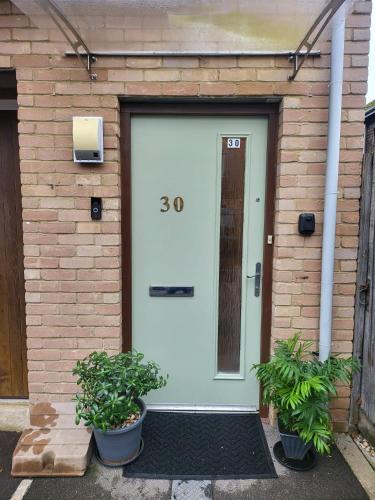 入口, The Cosy Coach House in 切帕咸