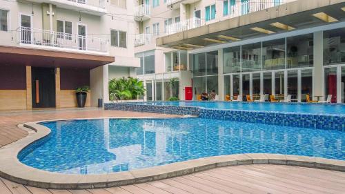 Homey and Nice Studio Bogor Icon Apartment By Travelio - image 5
