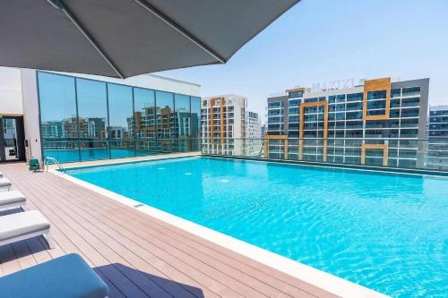 Vacay Lettings - Waves Grande - Sobha Hartland, Dubai (Foto 6)