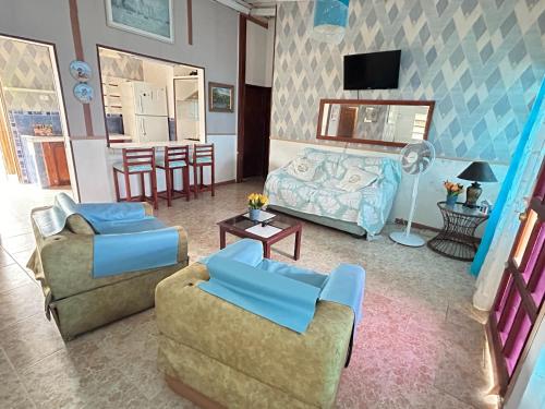 Shared lounge/TV area, Christanett Hosting in Chichiriviche