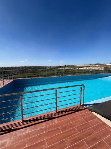 Swimmingpool, Bela Getaway Homes Executive one bedroom Apartment in Athi River