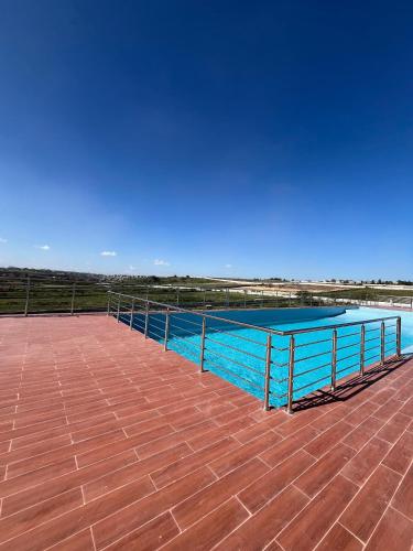 Swimmingpool, Bela Getaway Homes Executive one bedroom Apartment in Athi River