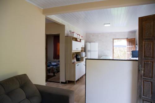 Koplietošanas atpūtas telpa ar TV, Sitio encantador e tranquilo com churrasq e Wi-fi in Venda Nova do Imigrante