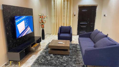 Koplietošanas atpūtas telpa ar TV, Norichyank Apartments in Amasaman