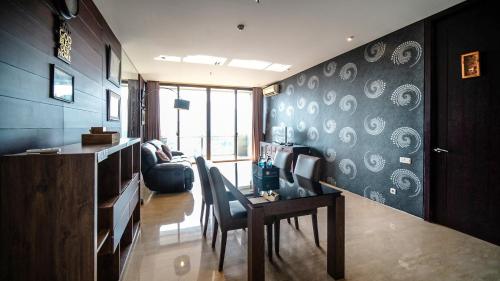 Spacious and Restful 2BR at Sumatra36 Apartment By Travelio - image 3