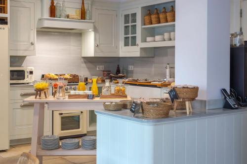 Ételek és italok, Hostal Boutique Es Portalet in San Feliu de Guixols