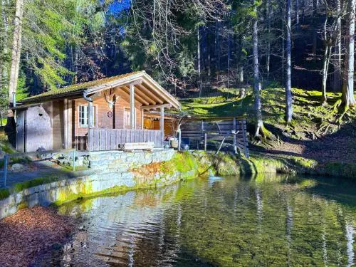 Idyllic Farm Cabin with Scenic Views and Concierge by SwissHut in Sigriswil, Schweiz