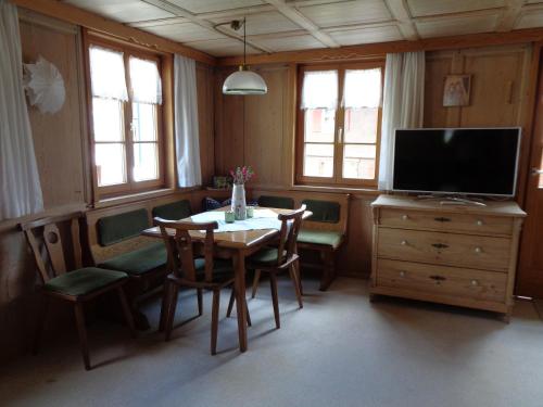 Közös társalgó / TV, Ferienwohnung Berktold in Bizau