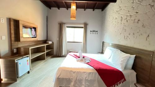 熱水浴缸, Pousada Flor de Pequi in 桑塔納杜裡亞舒