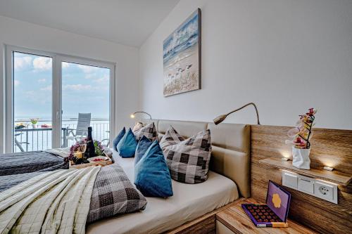 Fewo Kleine Auszeit by Seeblick Ferien ORO, direkter Wasserblick, am Strand (Fewo-Kleine-Auszeit-by-Seeblick-Ferien-ORO-direkter-Wasserblick-am-Strand) in Olpenitz