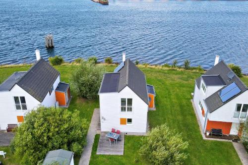 Ferienhaus An der Ostsee by Seeblick Ferien ORO, direkte Wasserlage,Sauna,E-Säule in Olpenitz, Deutschland
