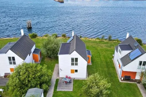 Ferienhaus An der Ostsee by Seeblick Ferien ORO, direkte Wasserlage,Sauna,E-Säule in Olpenitz, Deutschland