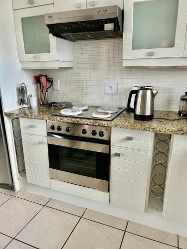 Kitchen, Waters Edge Guest House in Aston Bay