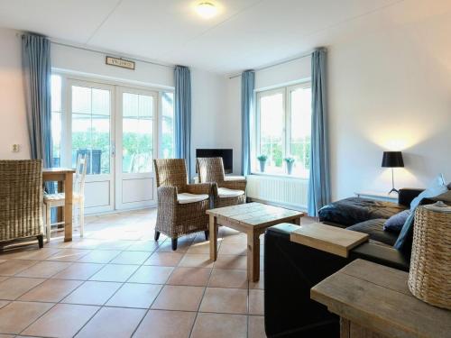 Exterior view, Charming villa with terrace near forest in Sint Maartensvlotbrug