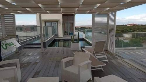 Penthouse Hôtholrie vue mer avec piscine A Gammarth Touristique – khách sạn tại Gammarth