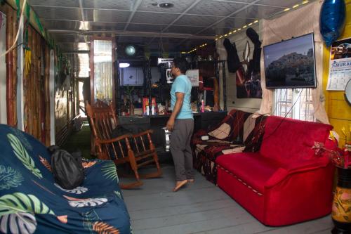 Közös társalgó / TV, Hostal Café Axi (Hostal Cafe Axi) in Isla San Cristobal
