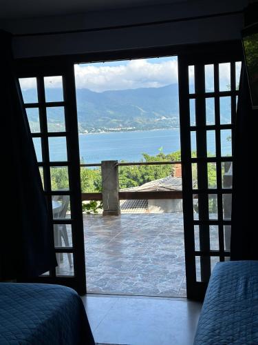 ระเบียง/ชานเรือน, Suites com vista para o mar in หาดเปเรเก