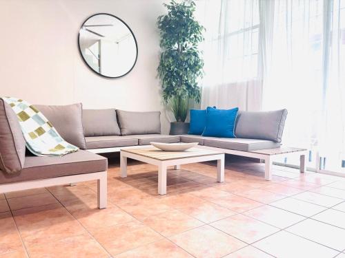 Modern beach stay, comfort steps from Luquillo beach, private jacuzzi in Luquillo