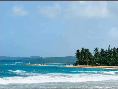 Steps from stunning beaches, near El Yunque and Carabali