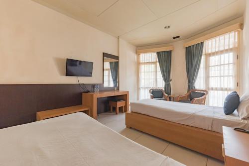 Urbanview Hotel Crown Tasikmalaya by RedDoorz in Indihiang