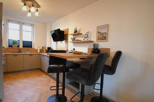 Kitchen, Ferienhaus Havingblick am Yachthafen in Seedorf in Altensien