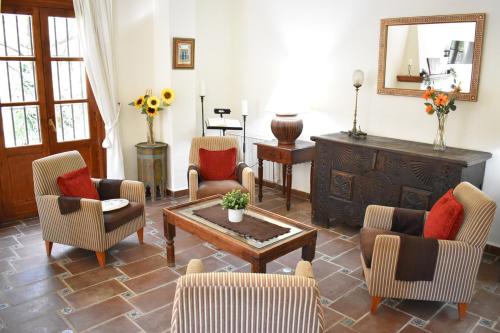 Zona de TV/saló-bar comuns, Hotel Humaina in Montes de Malaga