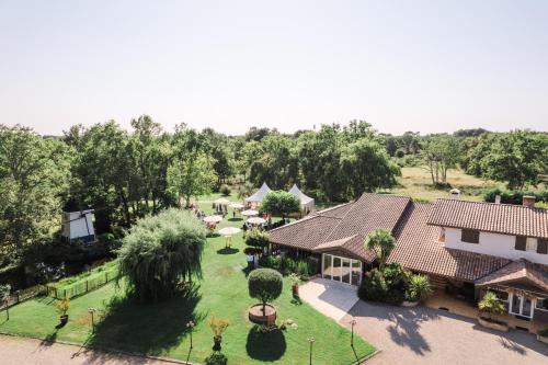 Hôtel La Ferme d'En Chon Hotel de charme Golf Biscarrosse