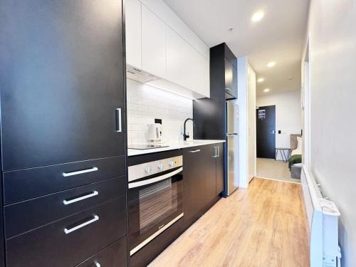 Modern Peaceful Studio Nearby Skytower & Queen St - Pool Gym & Sauna, Auckland (foto 9)