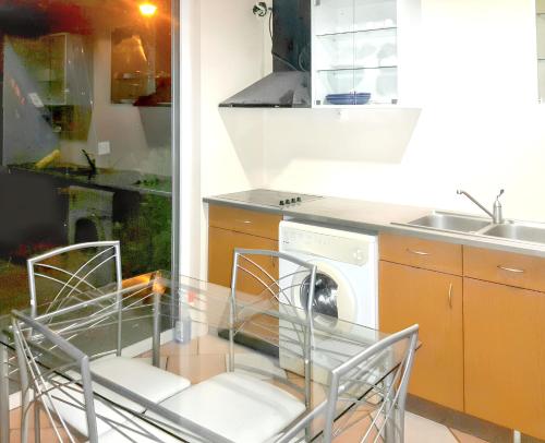 кухня, Appartement confort au Diamant 25 m² terrasse in Le Diamant