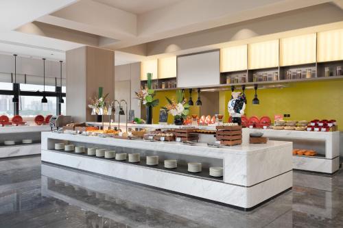 Hampton by Hilton Guangzhou Huangpu Sports Center – Guangzhou (Canton), IA