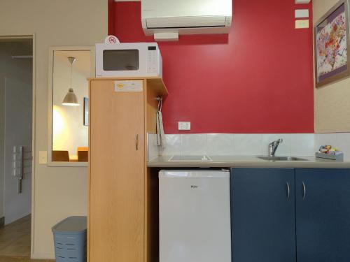 virtuvė, Landmark Manor Motel in Naujasis Pleimautas