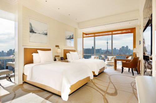 Premier Twin Room room in Four Seasons Hotel Tianjin