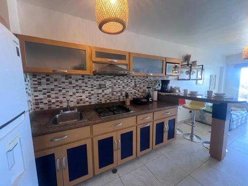 Manolo IV,playa y relajacion in 투카카스