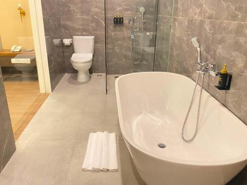 Deluxe Twin Room room in The Prime Canggu Bali by Kanaya Hospitality