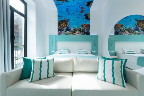 Suite with Garden View room in HD Acuario Lifestyle