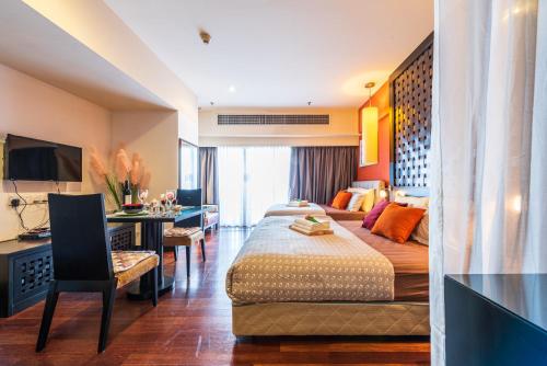 Resort Suites at Pyramid Tower by GL Staycation - Tap to explore photos