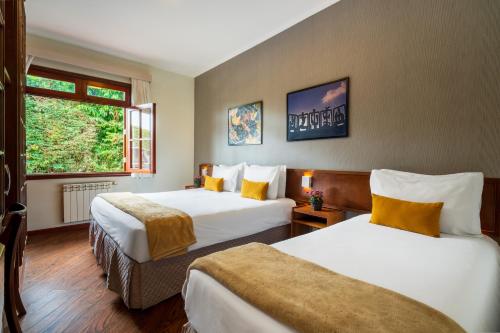 Luxury Triple Room room in Pousada Campos de Provence Campos do Jordão