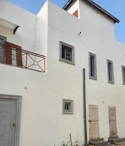 Exterior view, White House Residences in Tujereng