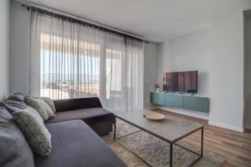 Two-Bedroom Apartment with Balcony and Sea View