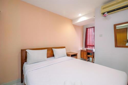 Classic and Cozy Studio at Cinere Bellevue Suites Apartment By Travelio