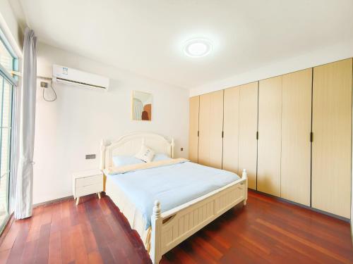 Shanghai Hills & LinkInn TimeLight 3-Bedroom Near SNIEC, Shanghái (foto 9)