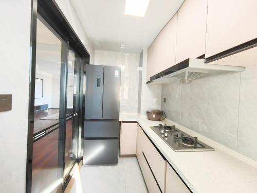 Shanghai Hills & LinkInn TimeLight 3-Bedroom Near SNIEC, Shanghái (foto 7)