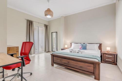 Waves - Spacious 1BR with Balcony & Cozy Interiors in JVC, Dubai (Foto 3)