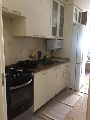 Apartamento Duplex em Itapema a 250 metros do mar in อิตาเปม่า