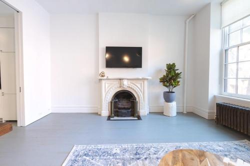 E10-2 Designer East Village Townhouse 1BR, New York (fotografie 4)