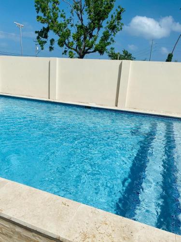Swimming pool, Alladin suites hospitality service in Bon Accord Village