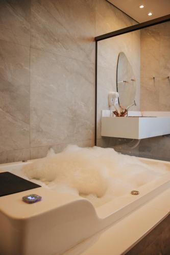 浴室, ALDRAVA POUSADA BOUTIQUE in 蒂拉登特斯