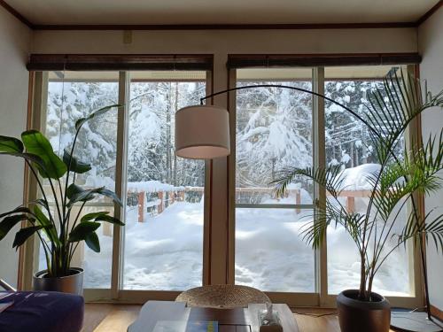 Shared lounge/TV area, Hakuba Third Place Lodge in Hakuba