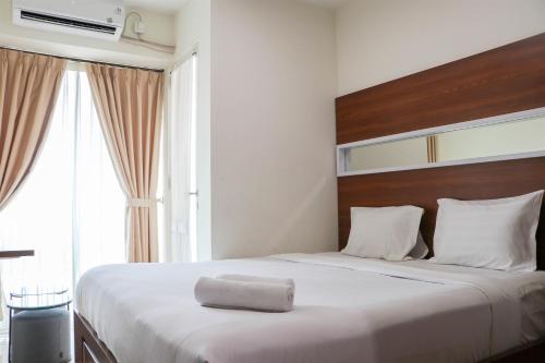 Restful 1BR without Living Room Grand Kamala Lagoon Apartment By Travelio